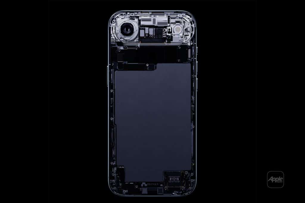 A smartphone with a transparent back, revealing internal components like the battery, camera, and circuitry—crafted with Apple 3D printing—displayed on a black background with a small Apple logo in the lower right corner.