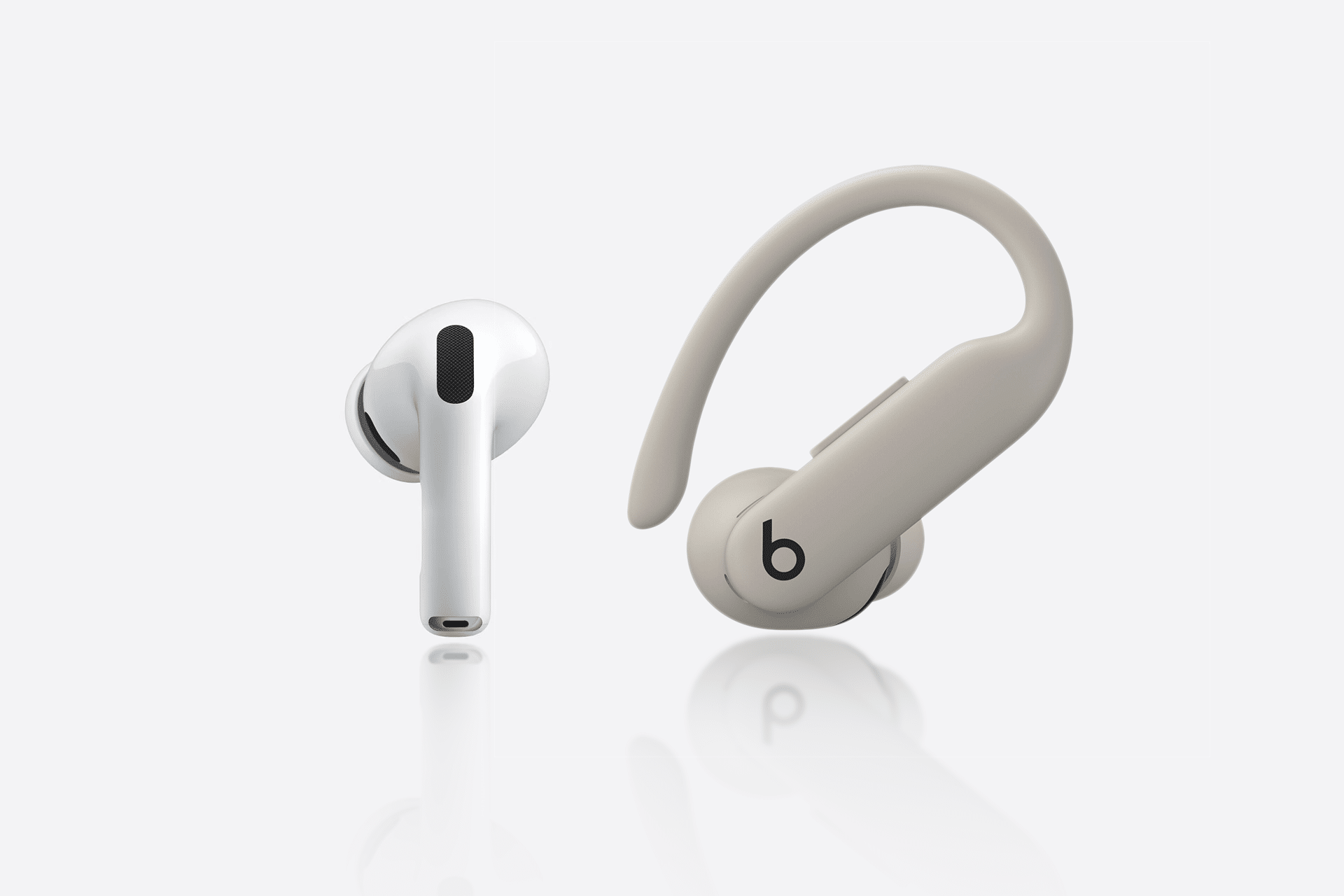 A white wireless earbud and a beige over-ear hook earbud with a "b" logo are displayed side by side, highlighting the design differences between AirPods Pro 3 vs Powerbeats Pro 2 on a clean white background.