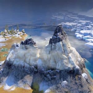 A pair of snow-covered rocky mountains rise near a coastline, with icy water and floating icebergs nearby—an untamed landscape reminiscent of a Civilization VII map, where sparse trees and patches of grass edge the snow beneath a cloudy sky.