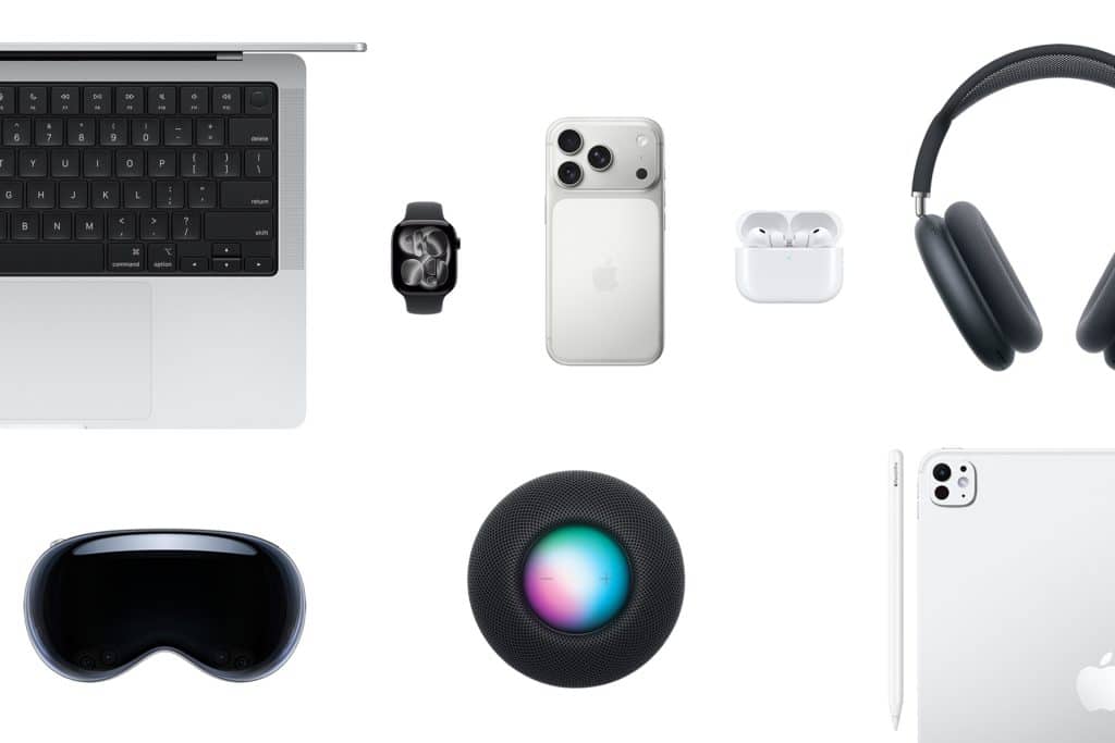 A flat lay of Apple active devices on a white background, including a MacBook, Apple Watch, iPhone, AirPods, AirPods Max headphones, HomePod, iPad, and Apple Vision Pro headset.