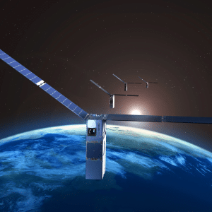 A group of small Apple Starlink satellites with solar panels orbits above Earth’s blue surface, as the sun rises in the background against the darkness of space.