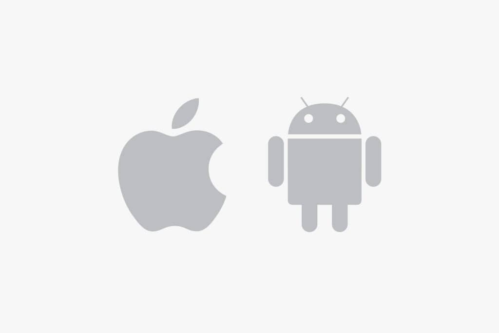 Gray Apple logo on the left and gray Android robot logo on the right, both centered on a plain white background, representing the iOS vs Android comparison.