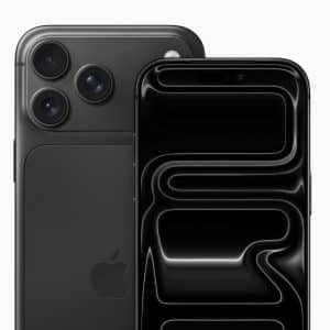 A black iPhone 17 Pro Black is shown from the back and front. The back displays three camera lenses, while the front screen is on with a black abstract pattern. The Apple logo appears in the bottom right corner.