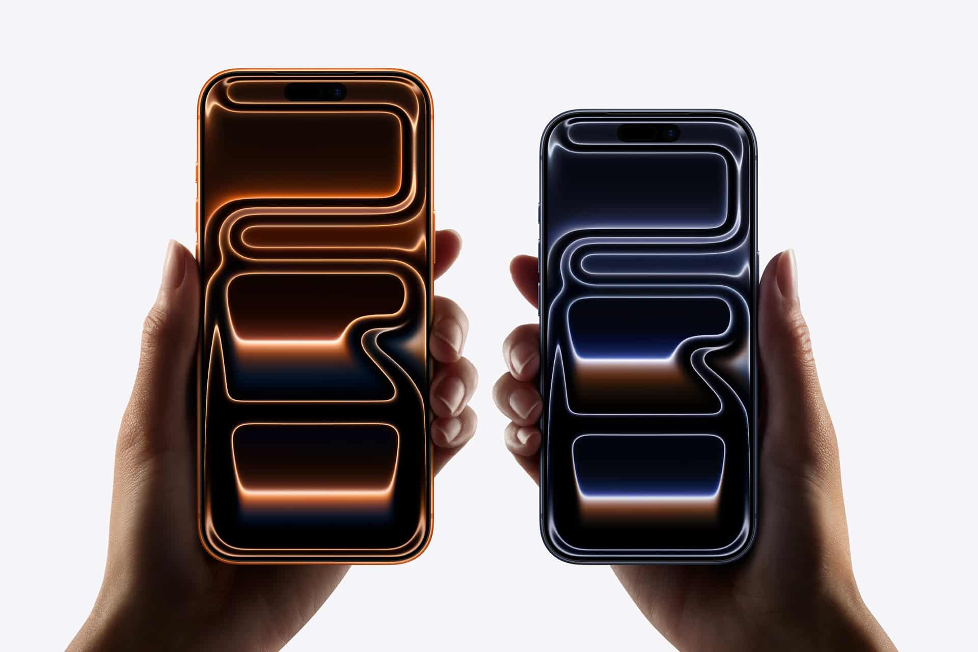 Two hands each hold a smartphone with glowing abstract neon designs—one orange and one blue—against a light background, capturing the innovative spirit of an AppleMagazine Cover Story.