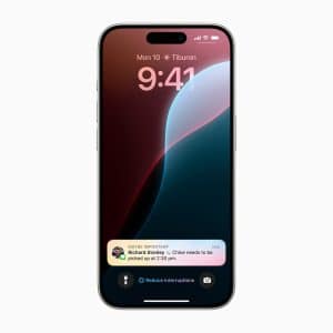 A smartphone displaying a lock screen with the time 9:41, date Monday 10, and location Tiburon. With iPhone Focus enabled, a “Reduce Interruptions” button sits above a notification: “Clinic needs to be picked up at 2:30 pm.”.