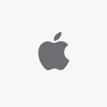 A simple gray Apple logo with a bite taken out of the right side and a detached leaf above, centered on a plain white background—perfect for showcasing the innovation behind Apple 2025 Results.