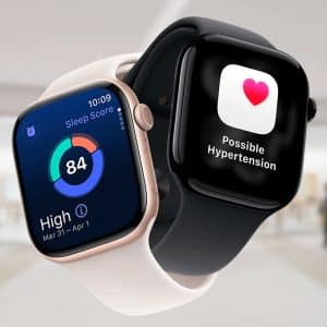 Two Apple Watches are displayed in front of a blurred store background. One shows a sleep score of 84 and “High” quality; the other displays a Hypertension Notification and heart icon. The Apple logo appears in the corner.