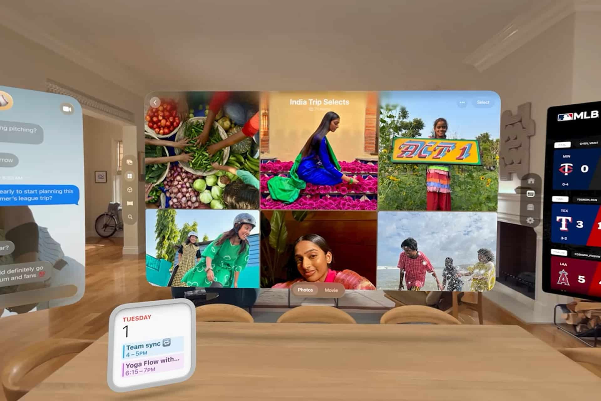 A virtual display in a modern living room, powered by visionOS 26 Beta, shows photos, messages, a calendar, and a sports scoreboard—all seen from the perspective of someone wearing an augmented or virtual reality headset.