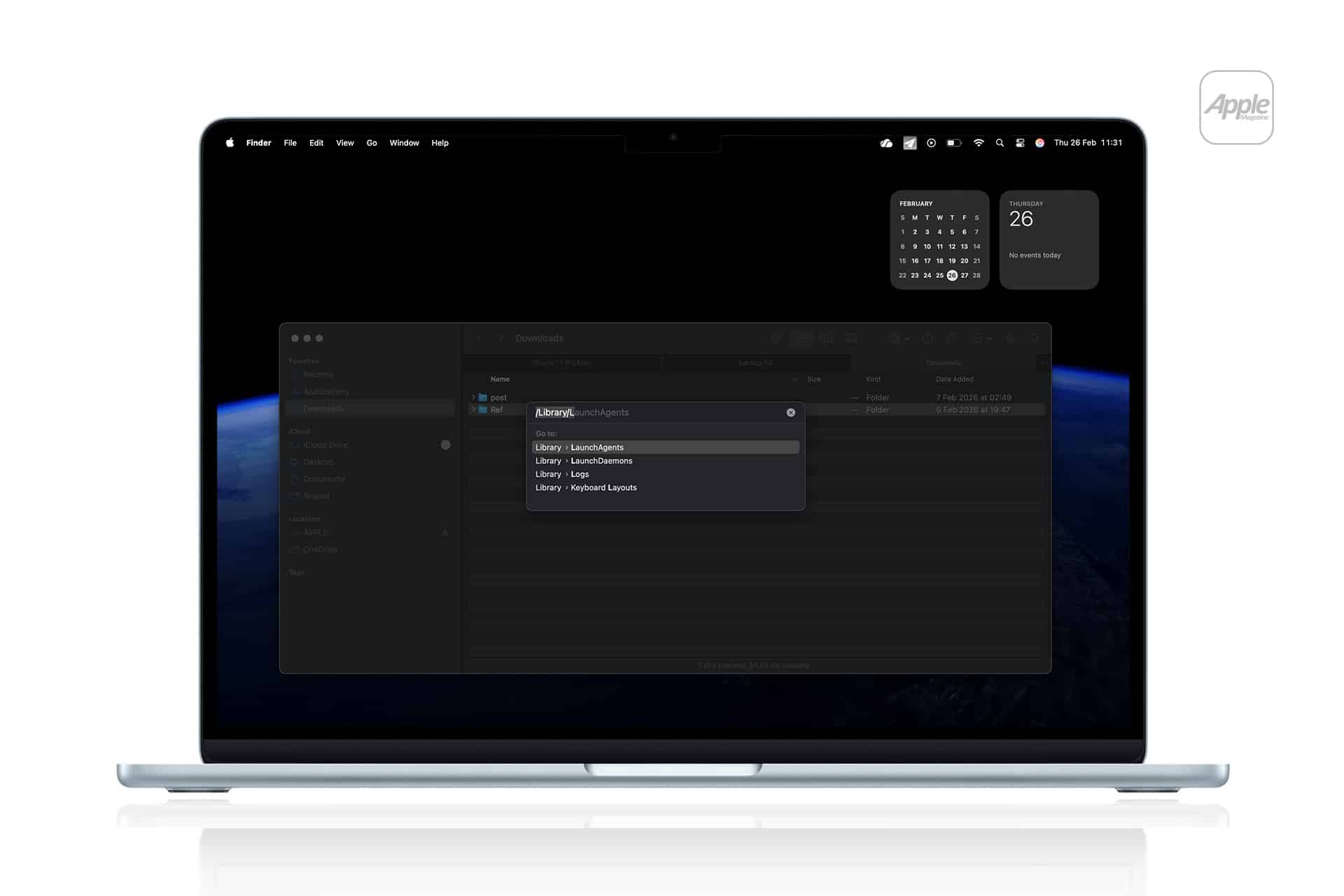 Mac Background Agents - A MacBook displays a dark-themed Finder window with a search for “Library,” hinting at Mac Background Agents, and a calendar widget showing October 26. The Apple logo is visible in the upper right corner of the white background.