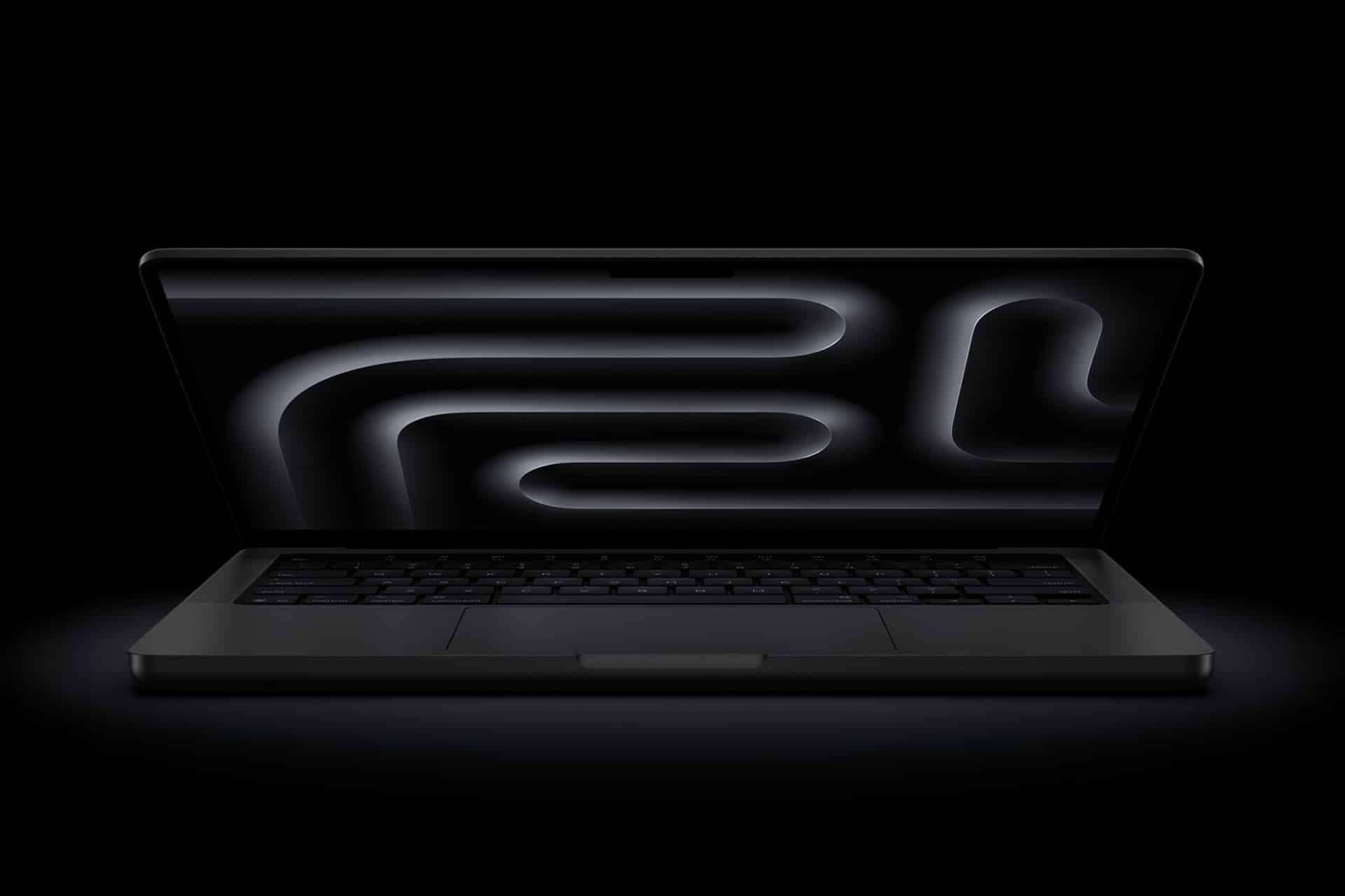 A sleek black MacBook Pro OLED is open on a dark surface, its screen displaying an abstract, glowing black and gray pattern of curved lines against a black background.