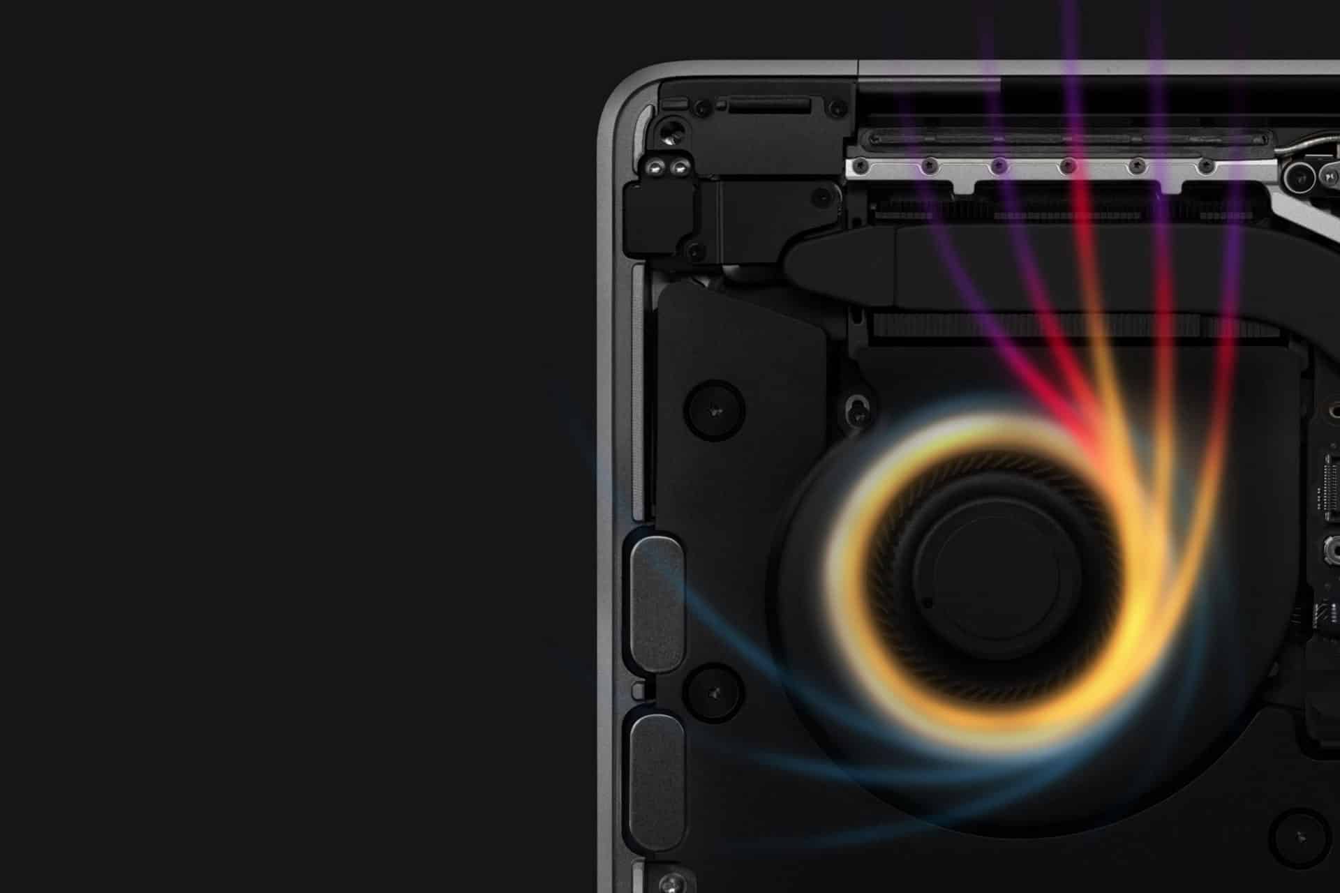 Close-up of a MacBook’s internal cooling fan with colorful airflow lines swirling upward, illustrating heat dissipation from an advanced M4 chip on a dark background.