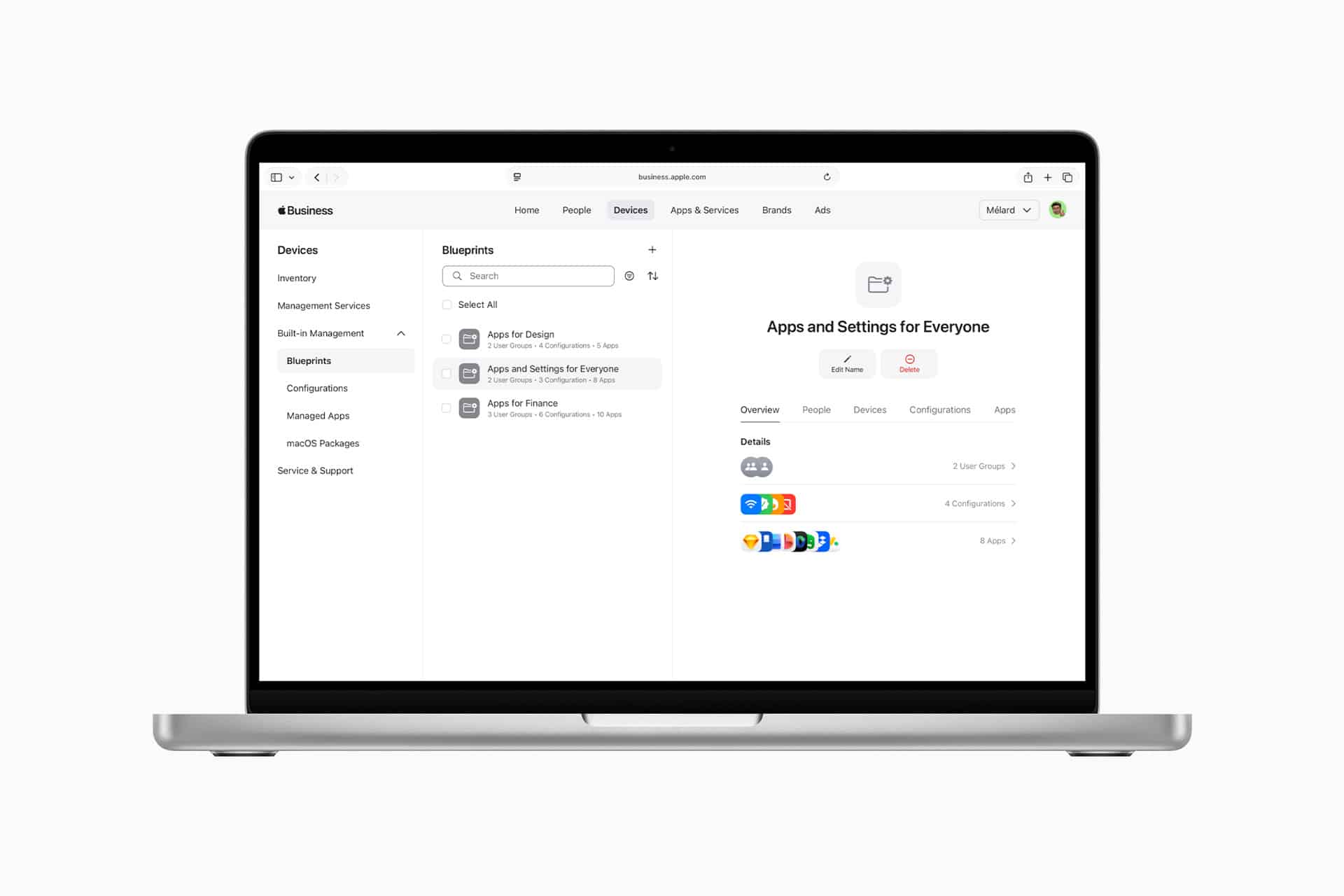 A laptop displays an Apple Business device management dashboard with options like Blueprints, Apps for Design, and Apps for Finance. The screen shows icons for popular apps and tabs for People, Devices, Configurations, and Apps.