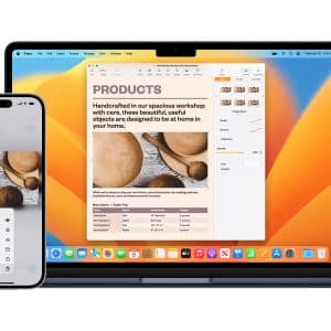 A smartphone and a laptop display the same document about handcrafted wooden products, demonstrating seamless integration and Clipboard History between devices. The laptop screen features an image and formatted text.