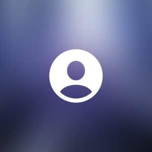A white user profile icon is centered on a blurred blue and gray background, suggesting a Mac Guest Account. In the bottom right corner, a small gray rounded rectangle contains the white Apple logo and the word "Apple.