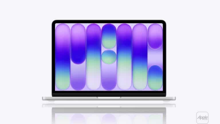 A silver laptop showcasing MacBook Neo performance features a colorful abstract design in purple, blue, and green on the screen, set against a white background with a small gray Apple logo in the bottom right corner.