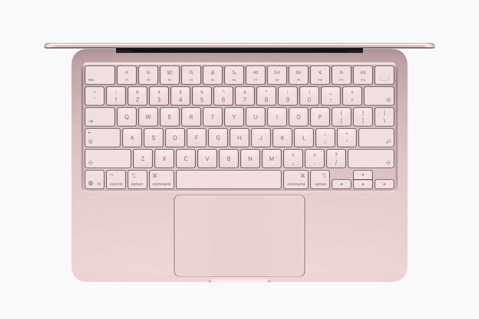 Top-down view of a rose gold laptop keyboard and trackpad, with the screen partially visible at the top edge. The keys are in a standard QWERTY layout, and the background is white.