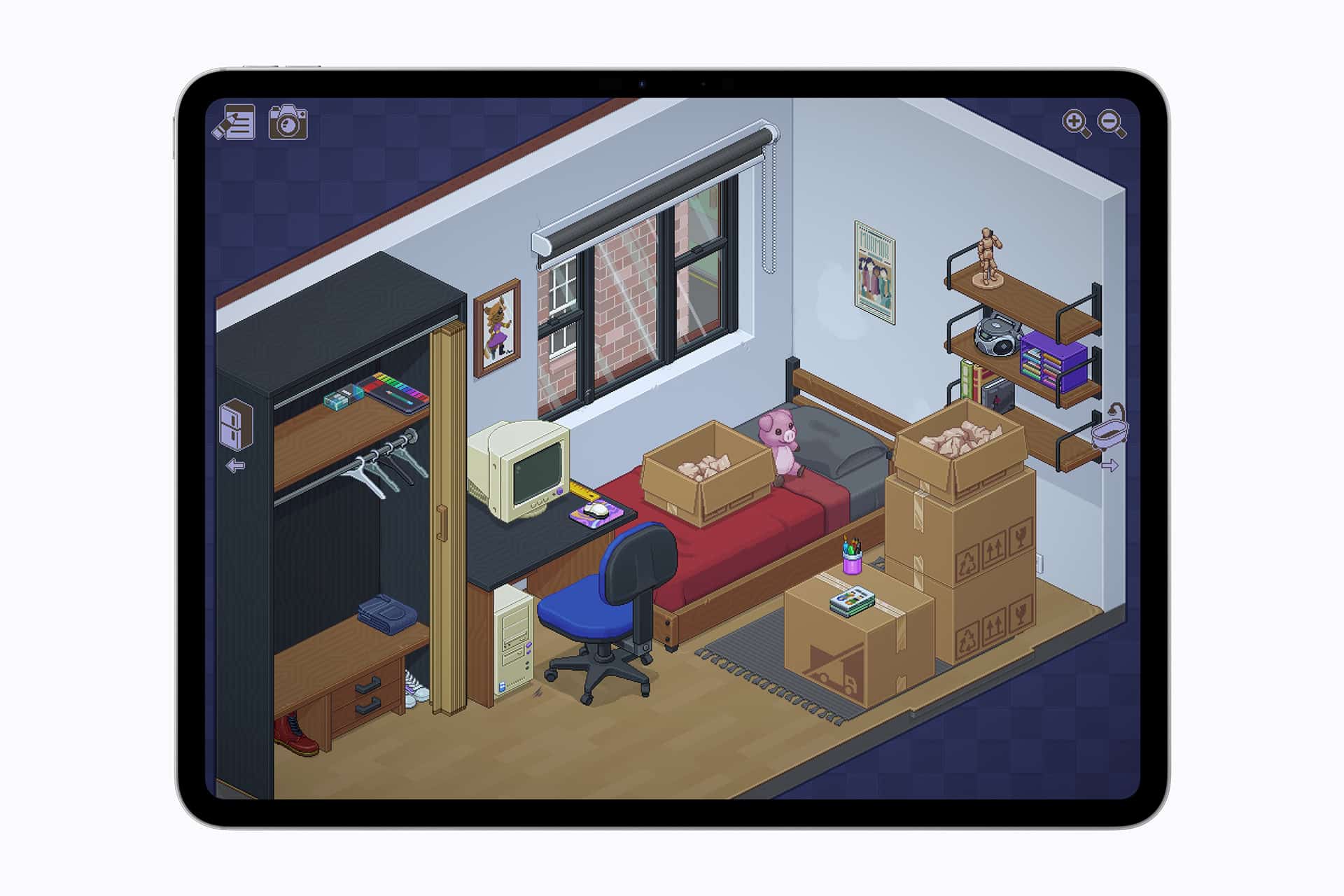 An isometric illustration on a tablet screen shows a small bedroom with a bed, desk, computer, unpacked boxes, and more—reminiscent of organizing for a fresh start. Perfect inspiration for cozy Apple Arcade April Games environments.