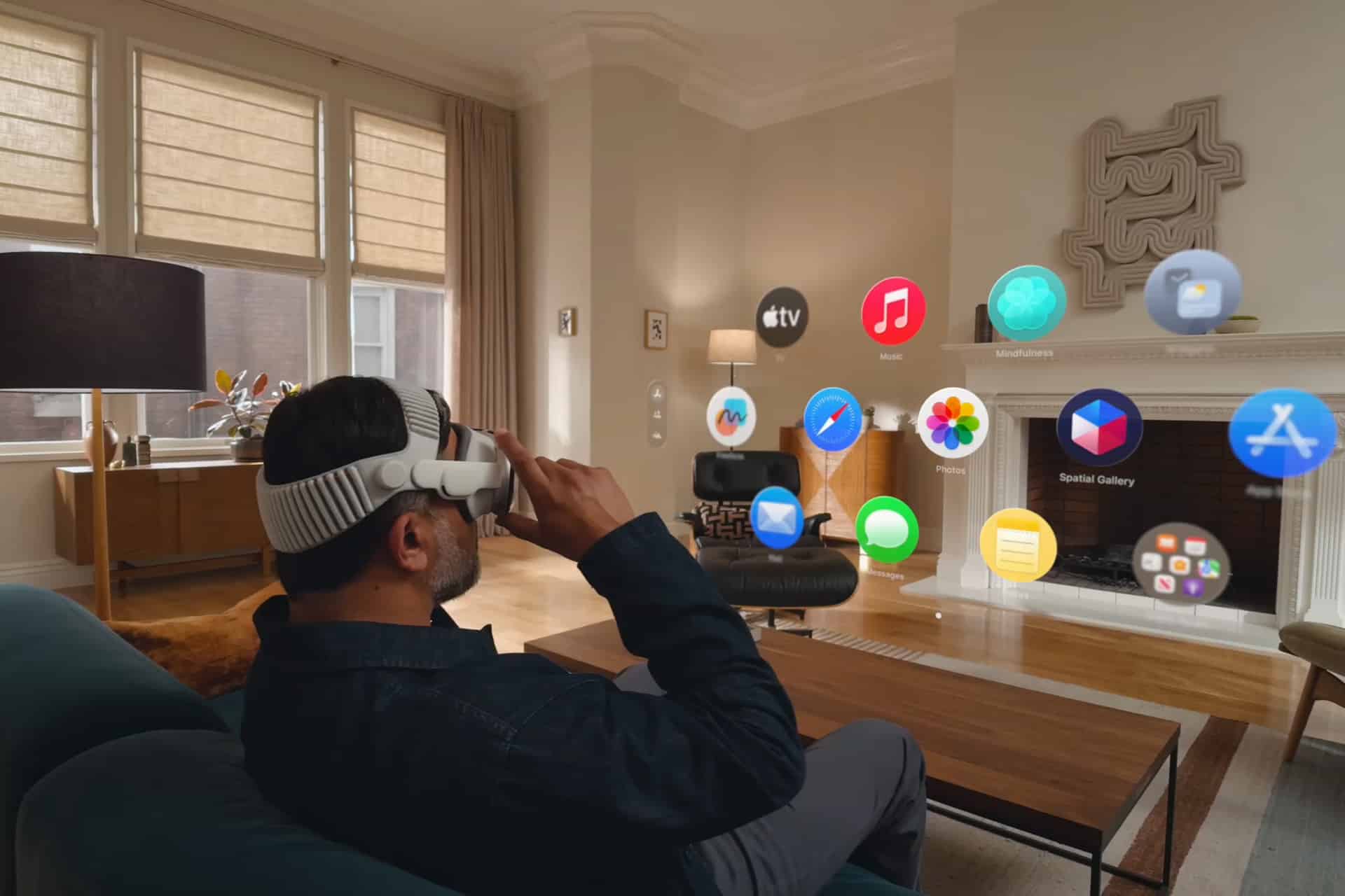 A person wearing a VR headset sits on a couch in a living room, interacting with floating digital app icons using Vision Pro Gestures, seamlessly blending virtual elements with the real home environment.