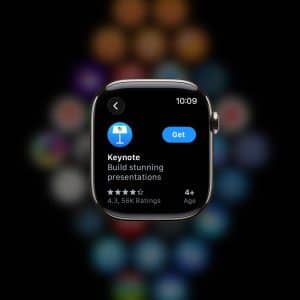 An Apple Watch screen displays the App Store page for Keynote, featuring its icon, name, “Build stunning presentations,” a 4.3-star rating, and a blue “Get” Apple Watch app install button. Colorful blurred app icons form the background.