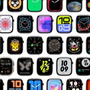 A grid of various Apple Watch Faces, each displaying different clock styles, colors, and designs, arranged on a white background. The watch faces show both analog and digital time formats for the Apple Watch.