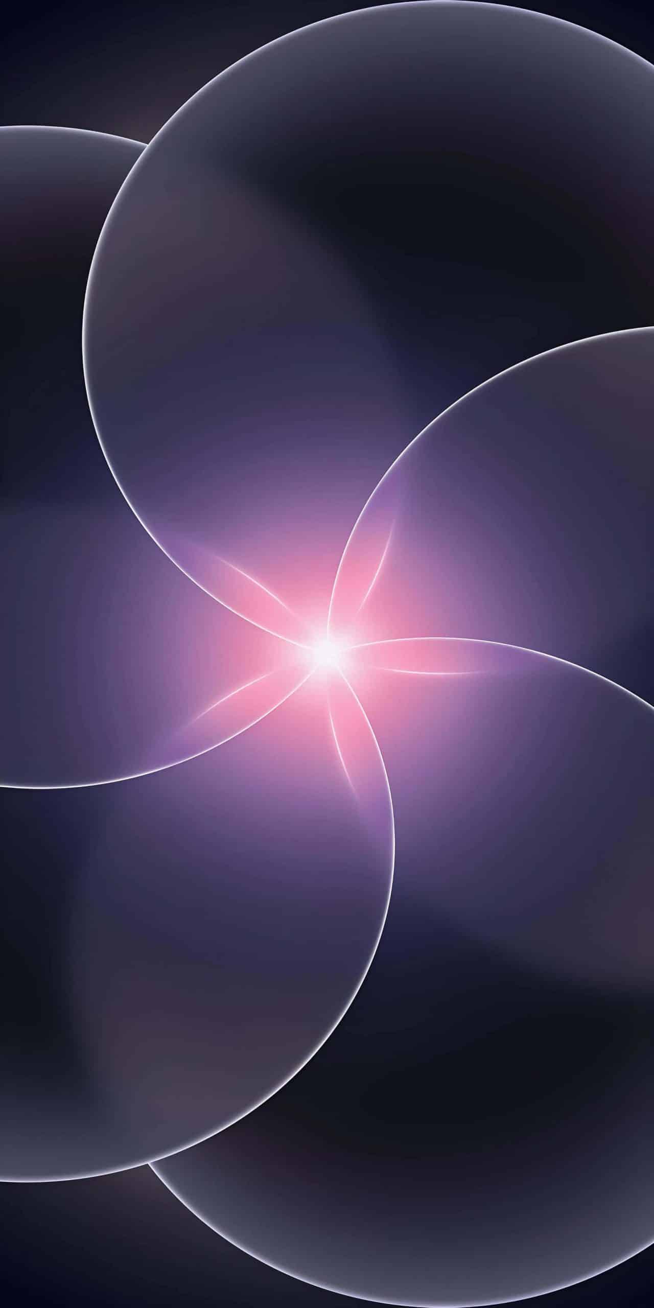 iPhone 17e wallpaper - Abstract digital art featuring four translucent, overlapping shapes creating a bright pink and white glowing center on a dark background with a soft gradient effect.