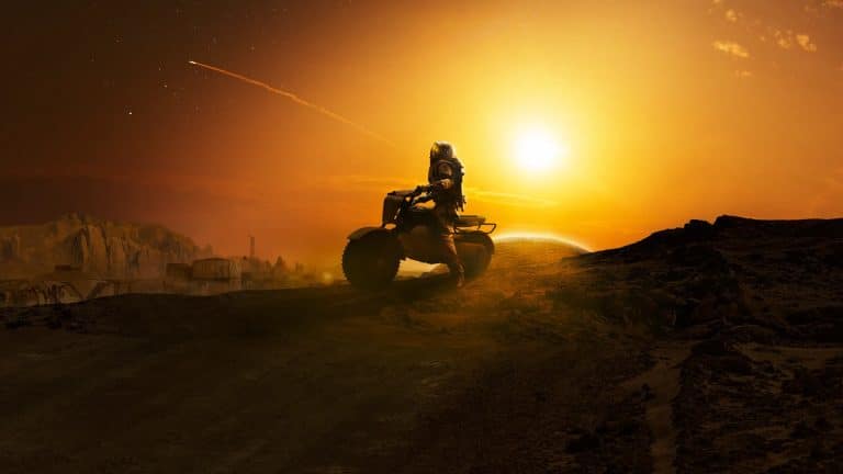 A person wearing a spacesuit rides an ATV on a rocky, barren landscape at sunset, beneath the orange sky of For All Mankind. A streak from a meteor or rocket arcs across the backdrop, highlighted by the setting sun.