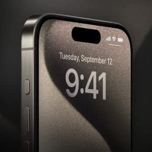 A close-up of the top half of a black iPhone 15 Pro Max displaying the time 9:41 and date Tuesday, September 12 on its lock screen, with the Apple logo in the bottom right corner.