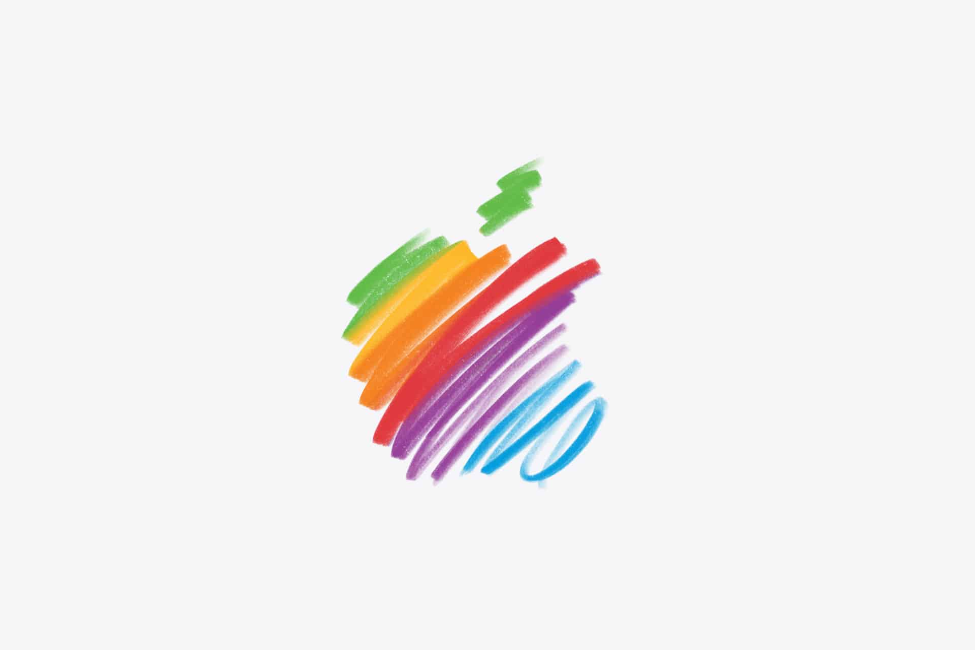 A stylized apple shape, inspired by a Tim Cook letter, is drawn with crayon-like strokes in rainbow colors—green, yellow, orange, red, purple, and blue—on a white background.