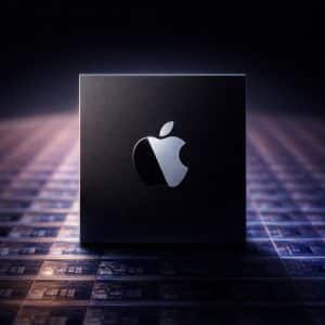 A black Apple silicon chip with a silver Apple logo stands upright on a surface covered with microchip patterns, illuminated by dramatic lighting—symbolizing the innovation in the Apple chip roadmap.