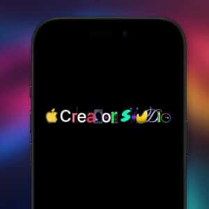A smartphone screen displays "Creators Studio," each letter styled as an Apple app icon, set against a dark background with colorful gradients. An Apple logo appears in the bottom right corner, highlighting the latest Creator Studio update.