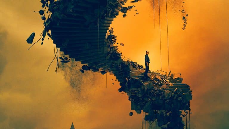 A person stands on a crumbling, spiral staircase made of debris, suspended in midair against an orange, smoky sky—echoing the surreal and dreamlike atmosphere of Silo Season 3, with distant structures barely visible in the background.