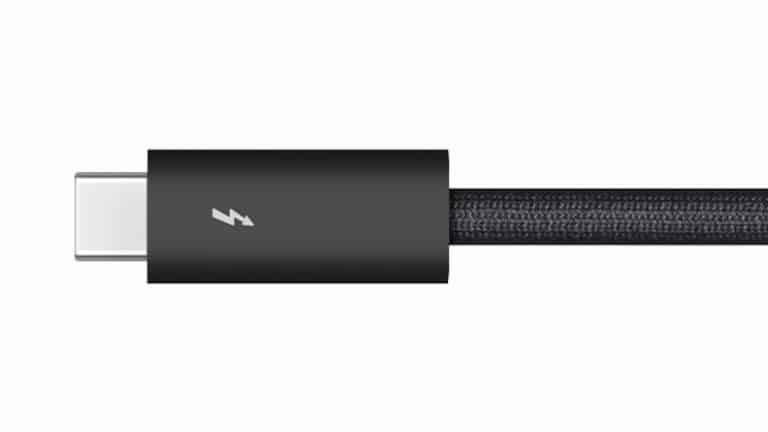 A close-up of a black braided USB-C Thunderbolt cable with a lightning bolt symbol on the connector, highlighting its high-speed capabilities. The white background accentuates the premium design found in modern Thunderbolt cables.