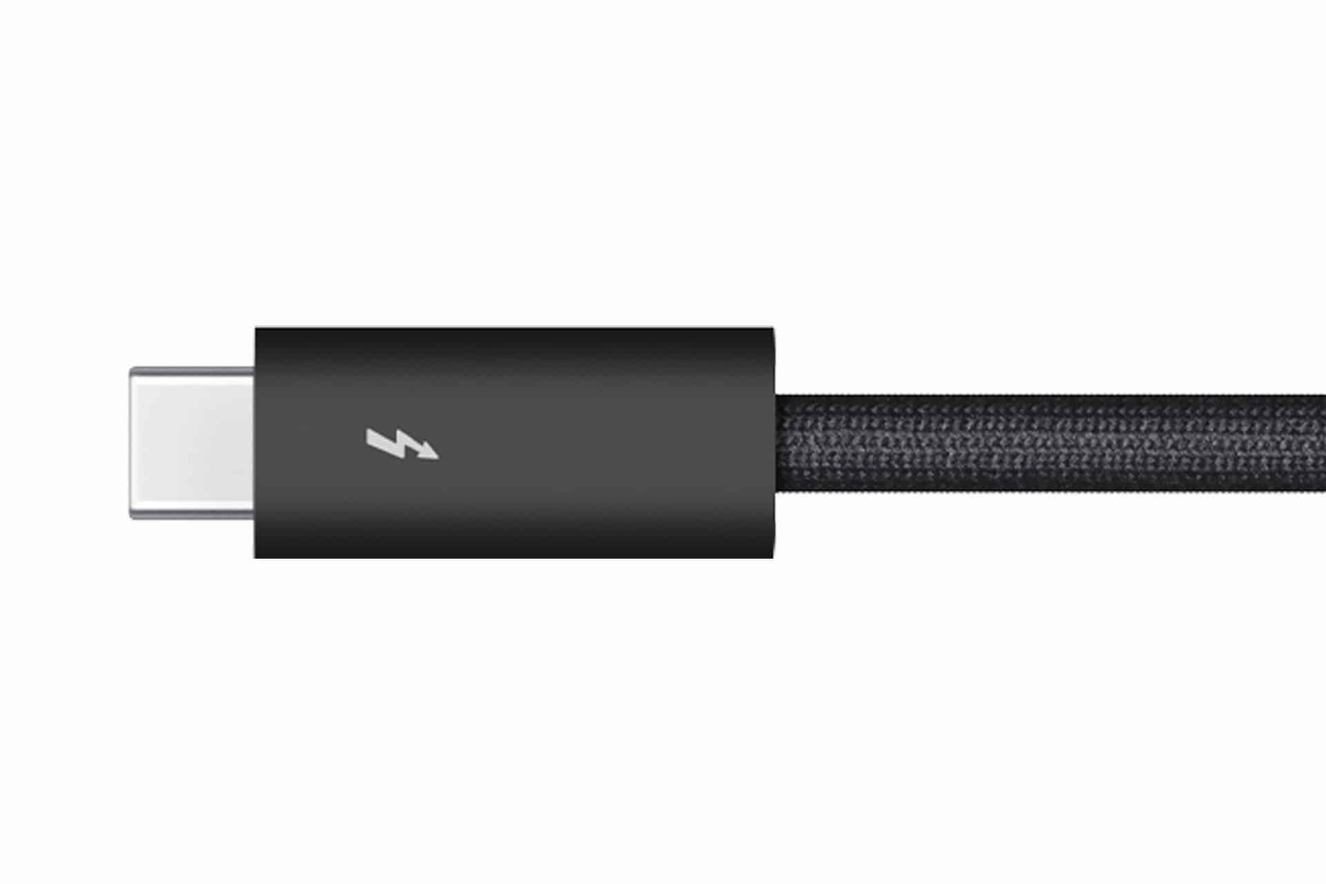A close-up of a black braided USB-C Thunderbolt cable with a lightning bolt symbol on the connector, highlighting its high-speed capabilities. The white background accentuates the premium design found in modern Thunderbolt cables.