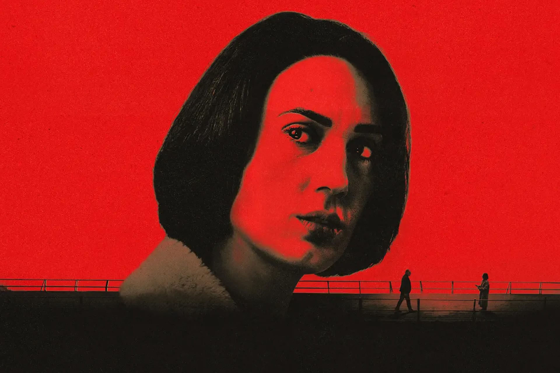 A woman’s face, tinted red and black, dominates the image against a bold red background. Part of the Unconditional series, two small silhouetted figures walk along a fence below, creating a dramatic contrast.