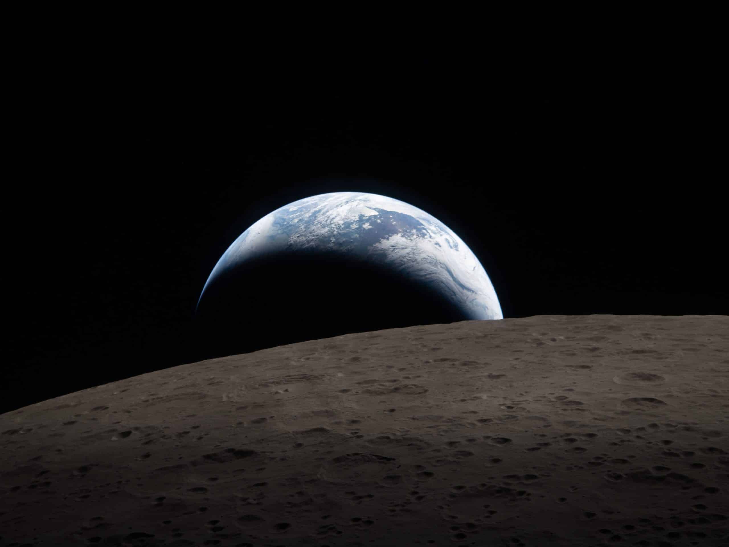 A view of Earth rising above the gray, cratered surface of the Moon, with Earth’s blue and white colors contrasting against the darkness of space—captured in incredible detail reminiscent of Apple GPU memory precision.
