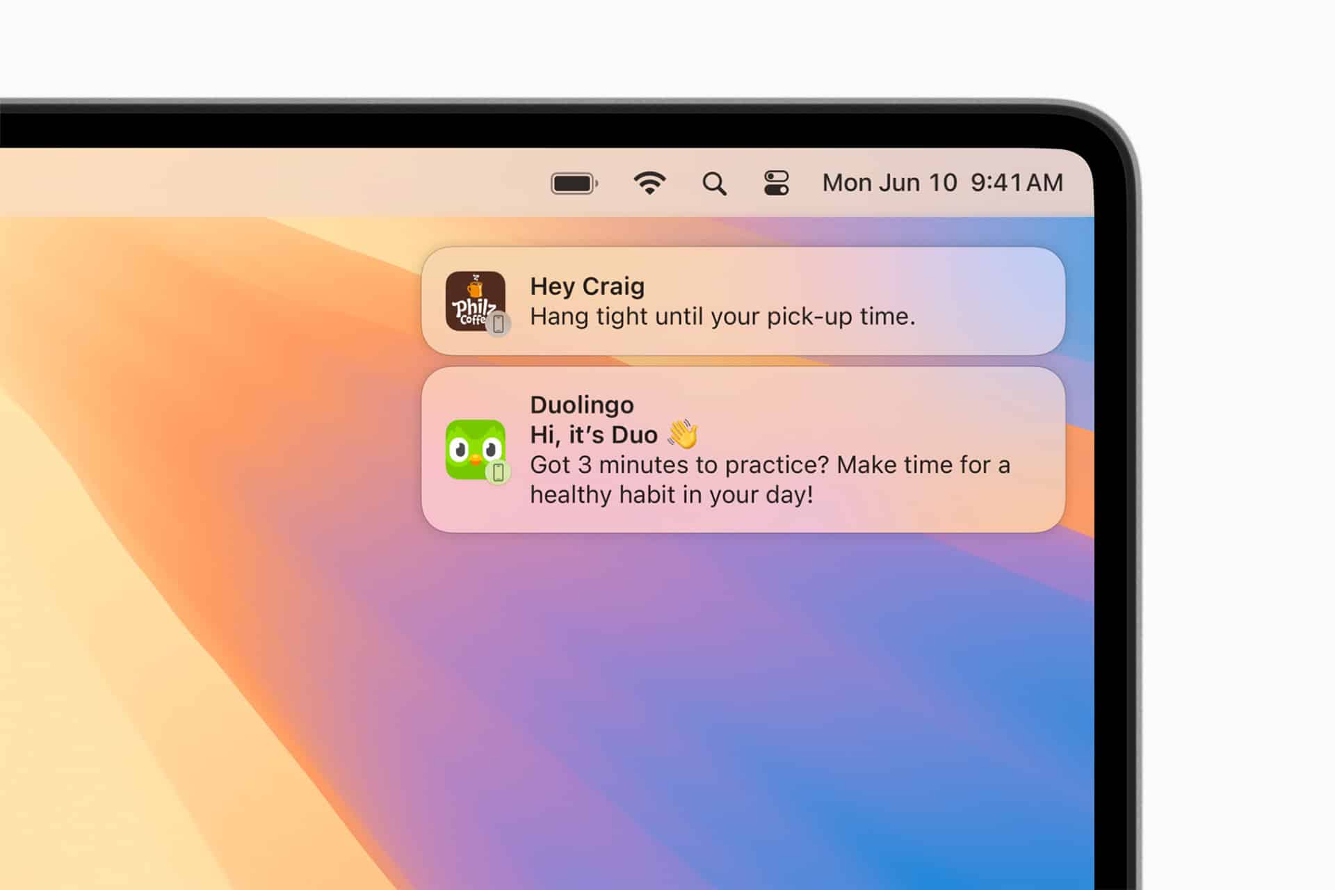A computer screen displays iPhone Mirroring with two notifications: one from “Hey Craig” about pick-up time, and one from Duolingo’s Duo reminding to practice for 3 minutes. The date and time in the corner are Mon Jun 10, 9:41 AM.