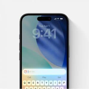 A smartphone with a pastel blue and green abstract wallpaper displays the time as 9:41 and the date as Tuesday, April 1. The screen shows a Siri prompt and a keyboard featuring a predictive text engine at the bottom.