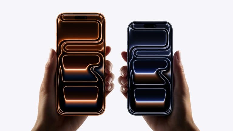 Two hands hold smartphones side by side. The left phone displays orange glowing lines on a black screen, while the right shows blue glowing lines. Both feature sleek designs and smooth visuals, thanks to advanced ProMotion scaling technology.