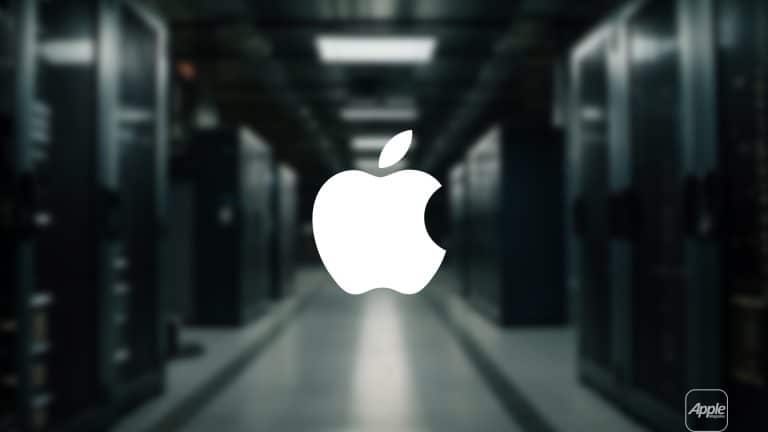A large white Apple logo is centered over a blurred background of a server room, hinting at rising AI server demand, with rows of server racks and dim lighting. The Apple branding also appears in a small icon at the lower right corner.