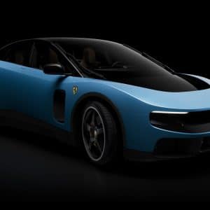 A sleek, blue sports car with a matte finish, black accents, and tinted windows, shown on a black background. Aerodynamic curves hint at Jony Ive-inspired design, while a prominent grille and yellow badge evoke the innovative Ferrari Luce spirit.