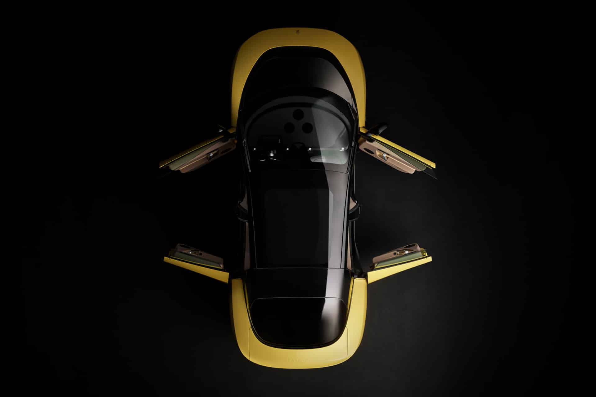 Top view of a sleek, yellow and black car with its four doors open, reminiscent of the Ferrari Luce, positioned against a solid black background. The lighting highlights the car’s smooth curves and modern design.