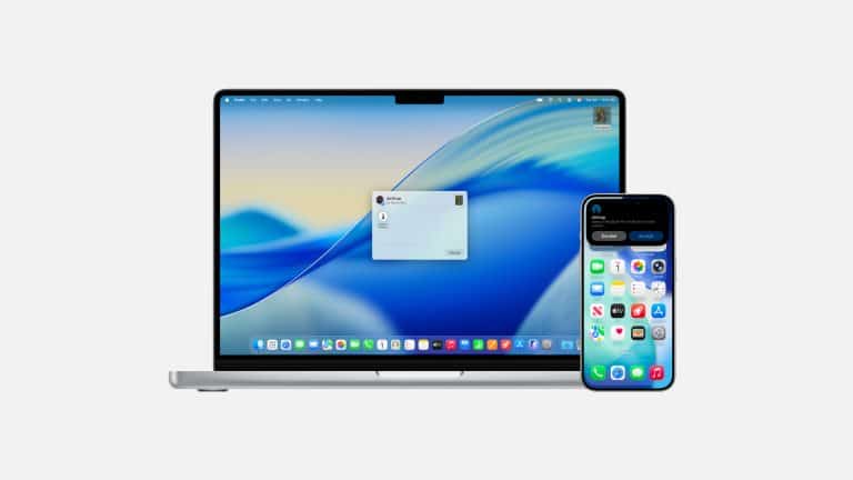 A MacBook with a login prompt displayed on its screen sits next to an iPhone showing its home screen, both against a plain white background, highlighting seamless device connectivity through features like Mac AirDrop.