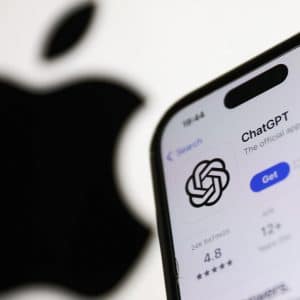 A smartphone displays the OpenAI ChatGPT app page in the App Store, showing its logo and rating, with a large, blurred Apple logo in the background, highlighting the integration of Apple AI technology.