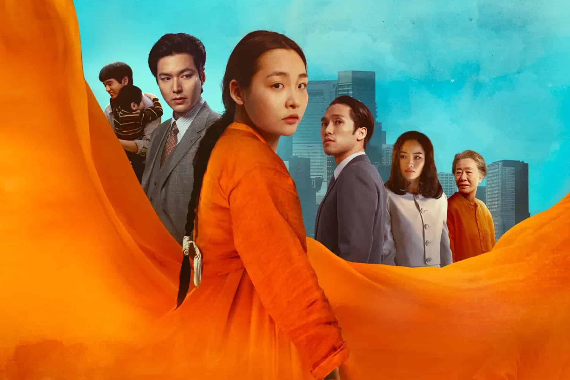 A woman in an orange dress stands in the foreground, flowing fabric circling her. Five others stand behind her against a city skyline under a blue sky. Everyone looks serious and contemplative, ready for an unforgettable Apple TV weekend.