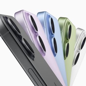 Five smartphones in different colors (black, purple, blue, green, and white) are shown side by side, highlighting their dual rear cameras and sleek, modern design—a look fueling iPhone 17 demand among style-conscious users.