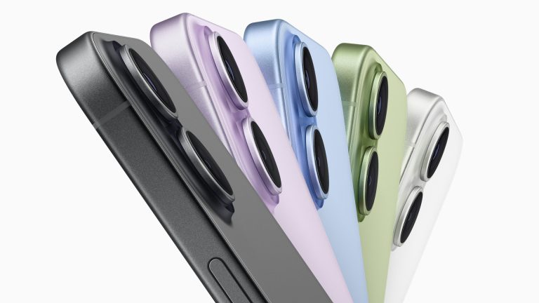 Five smartphones in different colors (black, purple, blue, green, and white) are shown side by side, highlighting their dual rear cameras and sleek, modern design—a look fueling iPhone 17 demand among style-conscious users.