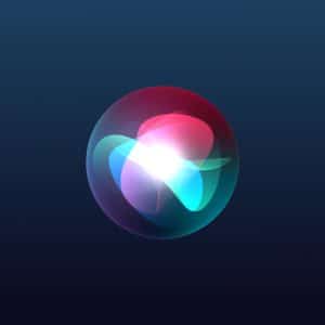 A glowing, multicolored orb with overlapping blue, green, and red light shapes floats on a dark blue gradient background, evoking a digital or futuristic interface—perfect for showcasing iOS 27 at WWDC26.