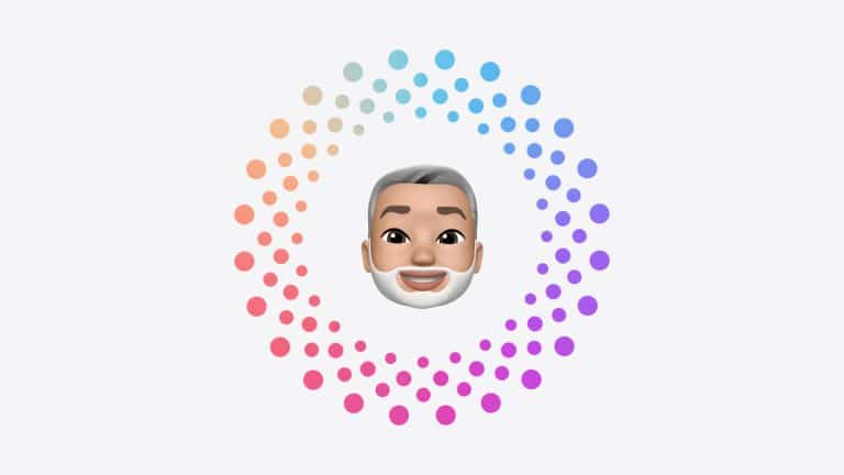 A cartoon-style avatar with gray hair and a white beard is centered inside a circle of colorful dots, arranged in a gradient from peach to blue to purple—perfect for guides or visuals related to Apple Account recovery. The background is light gray.