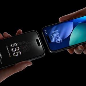 Two hands hold iPhones facing each other against a black background—one displays a $35 peer-to-peer payment screen, while the other shows a blue-green lock screen at 1:41.
