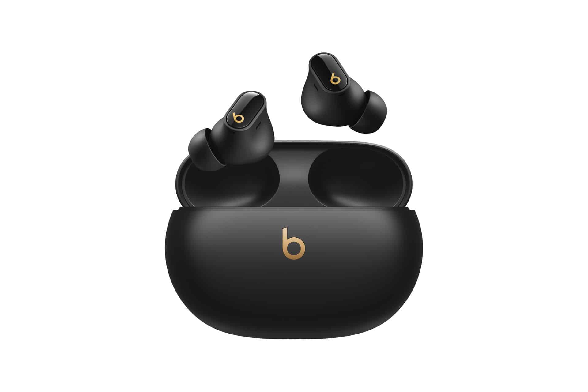 A pair of black Beats wireless earbuds with gold accents are shown above an open black charging case, both featuring the Beats logo. The background is plain white, highlighting their sleek Apple design and potential for easy firmware update.